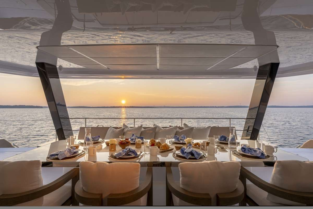 Charter Yacht Sol Dining at Sunset on Aft Deck Charter Yacht Sol Dining at Sunset on Aft Deck