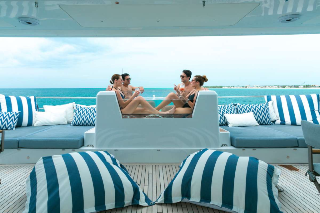 charter yacht blessed guests relaxing having drinks in pool on the yacht charter yacht blessed guests relaxing having drinks in pool on the yacht
