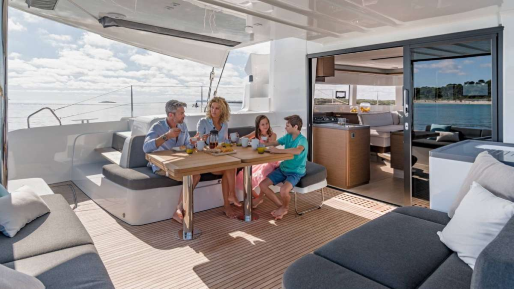 Charter Yacht Nauti Cat Family Dining Together at Sea Charter Yacht Nauti Cat Family Dining Together at Sea