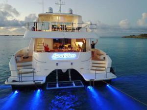 SeaGlass stern at dusk, Horizon 74, luxury power catamaran, caribbean charters, regency yacht vacations, crewed yachts