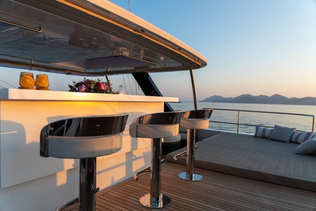 Sunset over the BVI from the flybridge of a luxury charter yacht