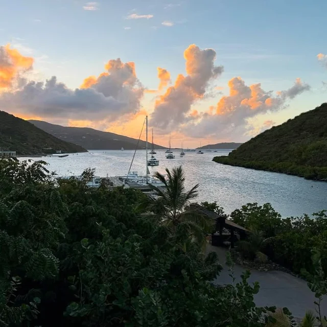Golden hour hits different in the BVI. 🌅 
Clouds glowing, sails swaying, and not a single reason to rush. ⛵️
